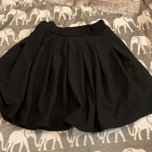 Black Pleated Skirt With Thigh Slit